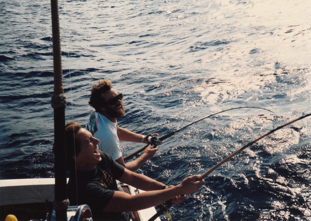 Circa mid 1980's. One of my all time favorite photos....John Everett and Charlie Pravel are hooked up to 80 pound class bigeye tuna on 8 foot rods and getting punished...the bigeye unexpectedly came through in an albacore stop and all they could do was laugh about how much they were getting their butts kicked by the big fish on such long rods. If I recall correctly they both got their fish. What great fun we had!