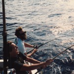 Circa mid 1980's.  One of my all time favorite photos....John Everett and Charlie Pravel are hooked up to 80 pound class bigeye tuna on 8 foot rods and getting punished...the bigeye unexpectedly came through in an albacore stop and all they could do was laugh about how much they were getting their butts kicked by the big fish on such long rods.  If I recall correctly they both got their fish.   What great fun we had!