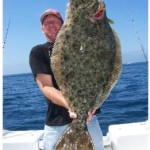 Captain Bob Woodard Jr. with a gorgeous 25.5 pound halibut caught at the Coronados aboard private boater John Wilson’s boat M. Angelina on June 15, 2007