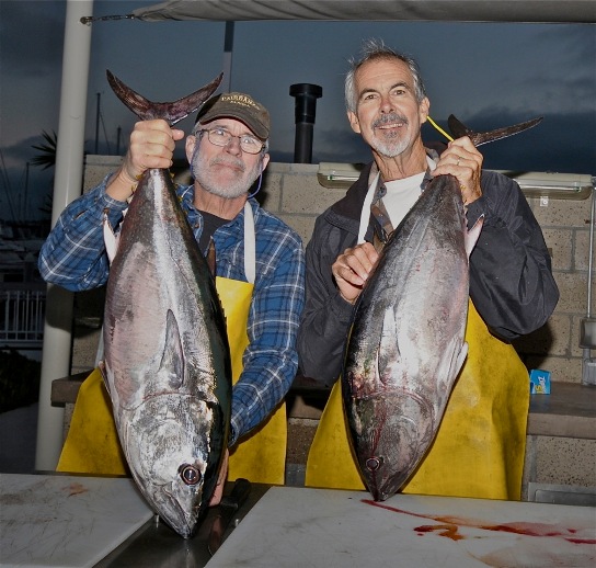 Private boaters Captain Bob Woodard (left ) of the Christina Lynn with Robb Lane of the AJ (right) and a couple of nice bluefin tuna caught on May 28, 2015